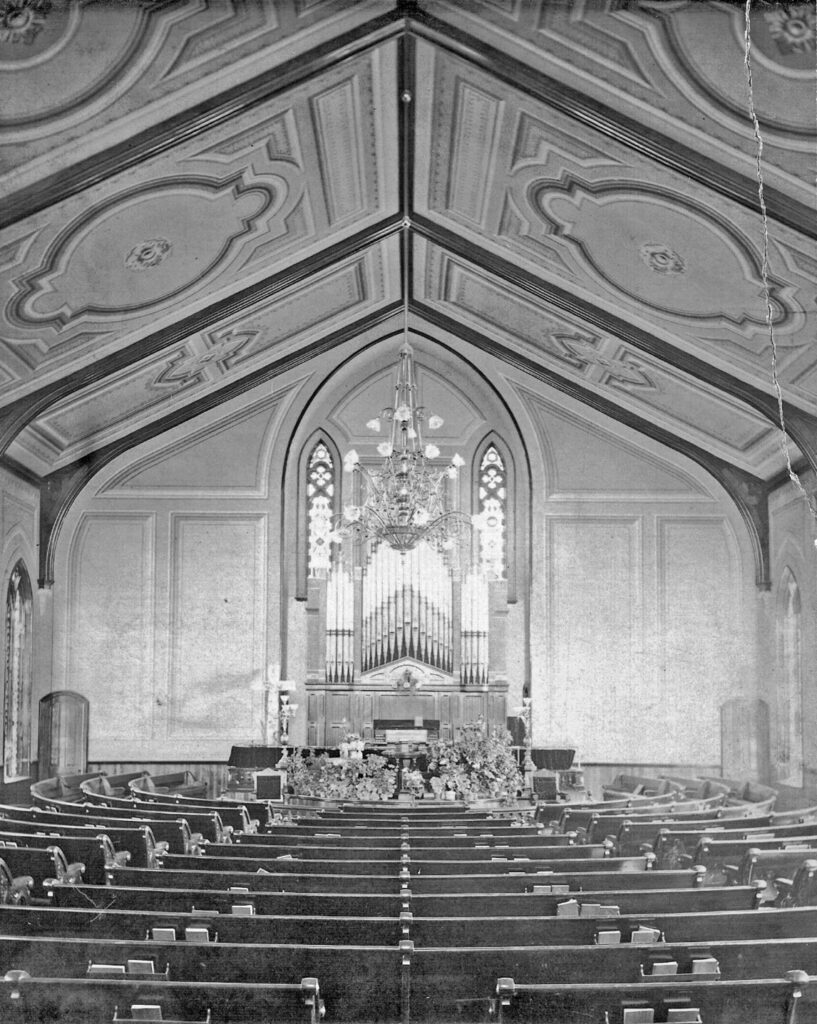 Historic photograph of the completed St. Paul’s sanctuary and chandelier